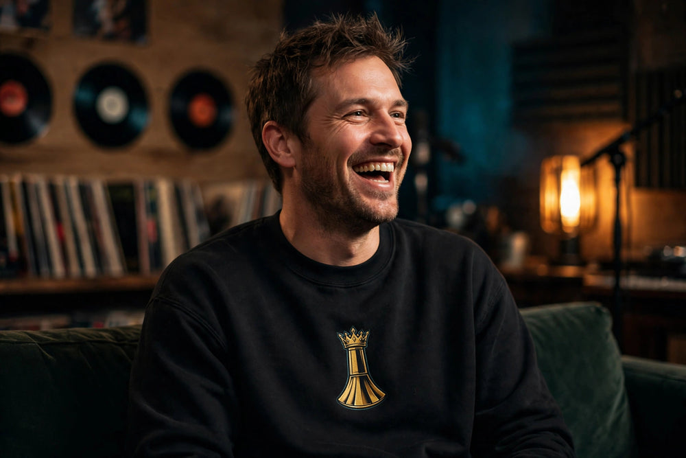 Pawn to King Crewneck worn in a recording studio lounge