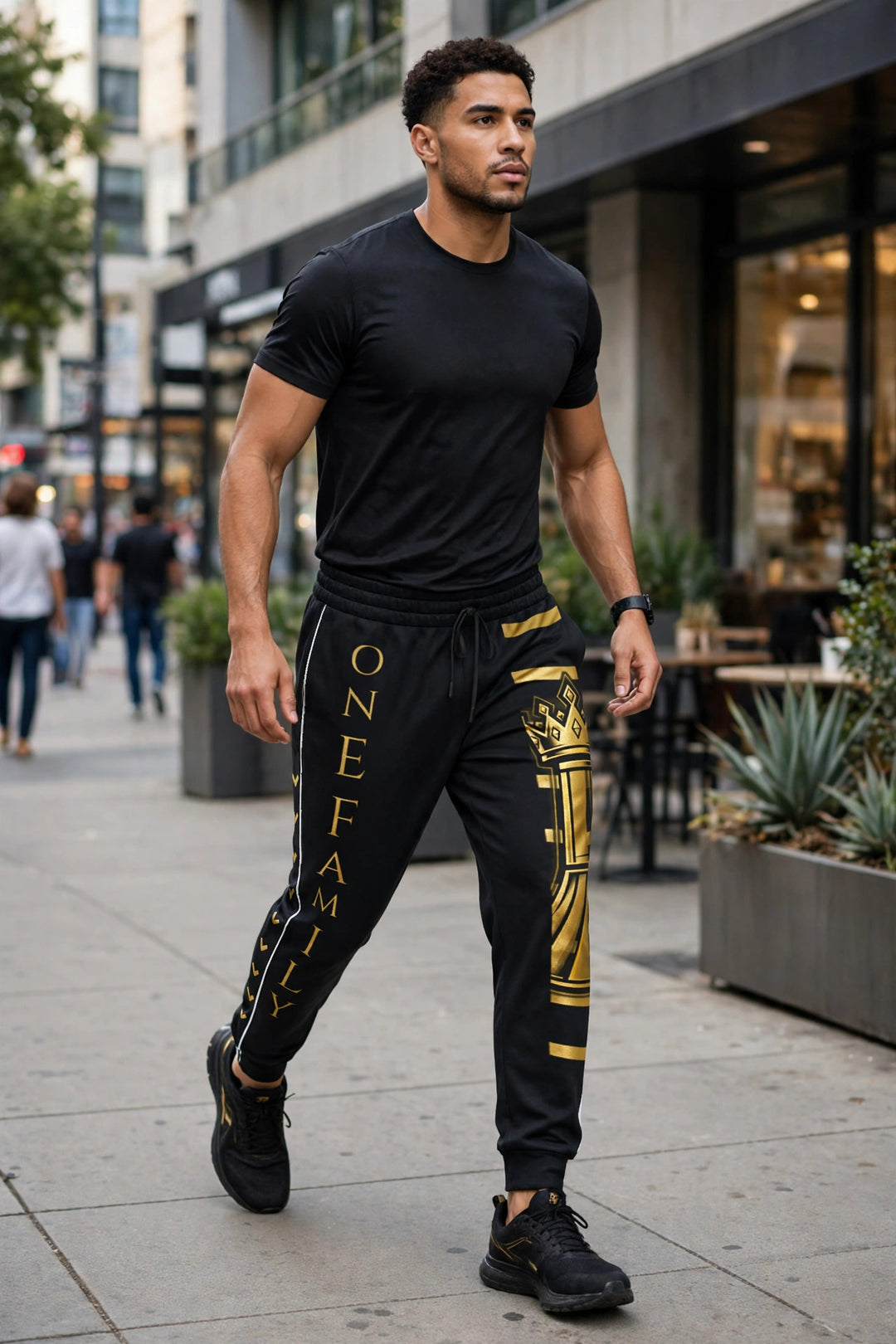 One Family Gilded Chevron Joggers, black with gold ONE FAMILY lettering and crowned king, street stride